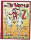 #12 The Tin Woodman of Oz
									The Tin Woodman, Nick Chopper, is unexpectedly reunited with his Munchkin sweetheart Nimmie Amee from the days when he was flesh and blood. Along the way, Nick discovers a fellow tin man, Captain Fyter, as well as a Frankenstein-like creature made from their combined parts.
