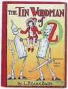 #12 The Tin Woodman of Oz
									The Tin Woodman, Nick Chopper, is unexpectedly reunited with his Munchkin sweetheart Nimmie Amee from the days when he was flesh and blood. Along the way, Nick discovers a fellow tin man, Captain Fyter, as well as a Frankenstein-like creature made from their combined parts.