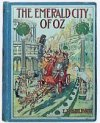 #6 The Emerald City of Oz
									Dorothy Gale and her Uncle Henry and Aunt Em come to live in Oz permanently. While they tour through the Quadling Country, the Nome King is tunneling beneath the desert to invade Oz.